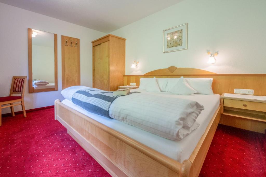 Posteľ alebo postele v izbe v ubytovaní Haus Waldhof