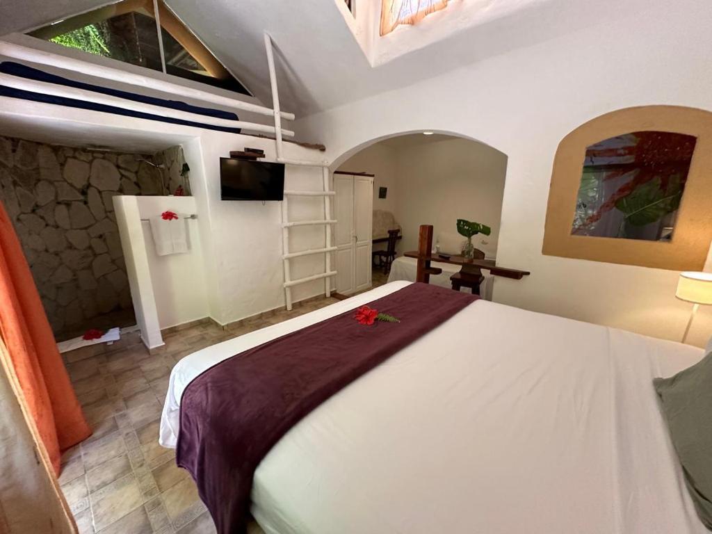 Postel nebo postele na pokoji v ubytování Cabrera Chalet boutique hotel