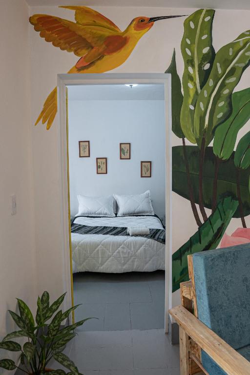 Postel nebo postele na pokoji v ubytování Laureles Garden Hostel