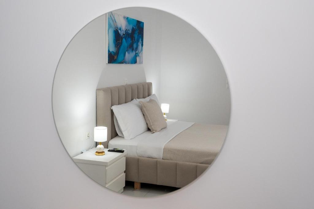 Postel nebo postele na pokoji v ubytování Kalasa Hotel