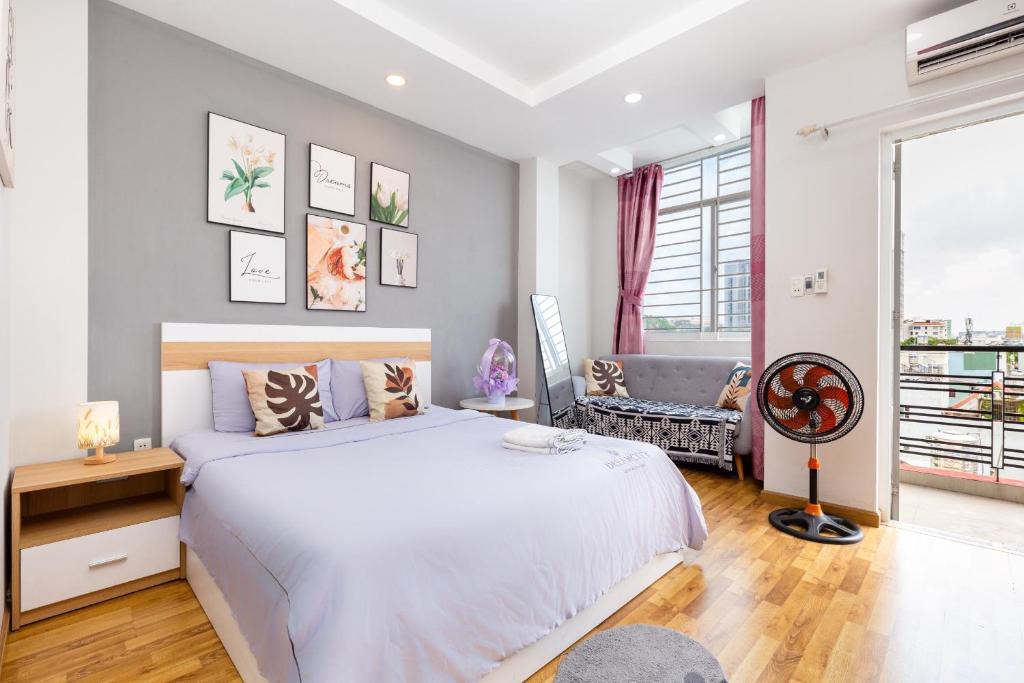 เตียงในห้องที่ Sweet Rentals Homes