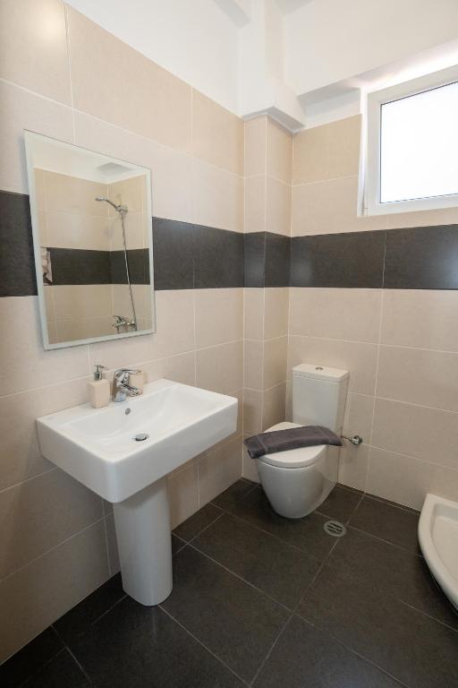 Koupelna v ubytování Kalasa Hotel
