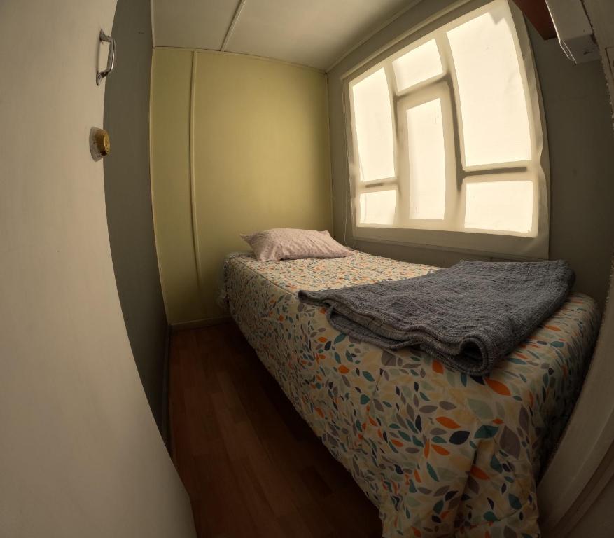 Postel nebo postele na pokoji v ubytování Hostel 53 Sur