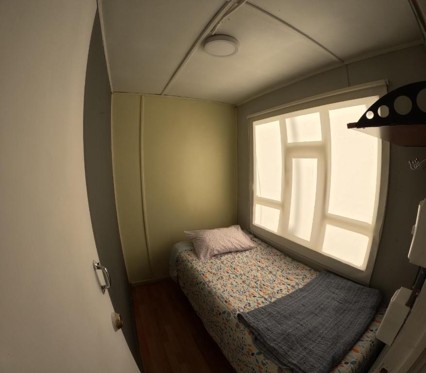 Postel nebo postele na pokoji v ubytování Hostel 53 Sur