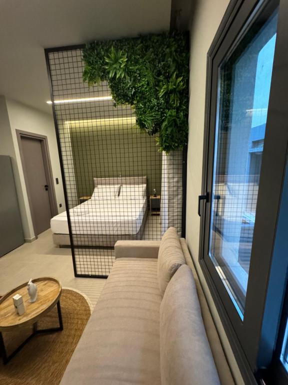 Postel nebo postele na pokoji v ubytování Baja Suites