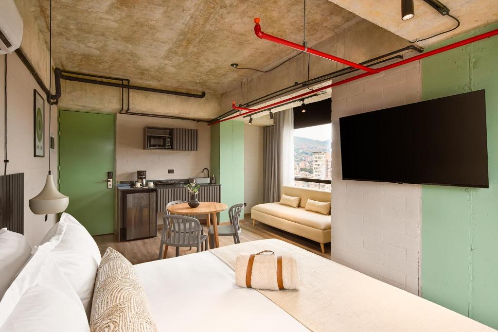 TV a/nebo společenská místnost v ubytování Urbit Social Lofts