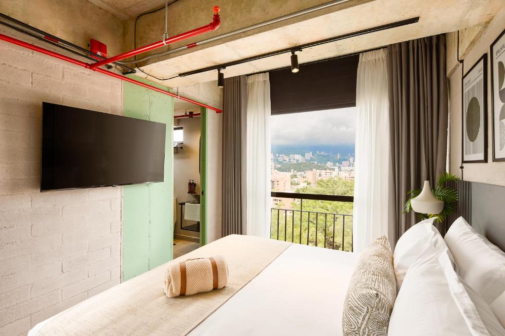 TV a/nebo společenská místnost v ubytování Urbit Social Lofts