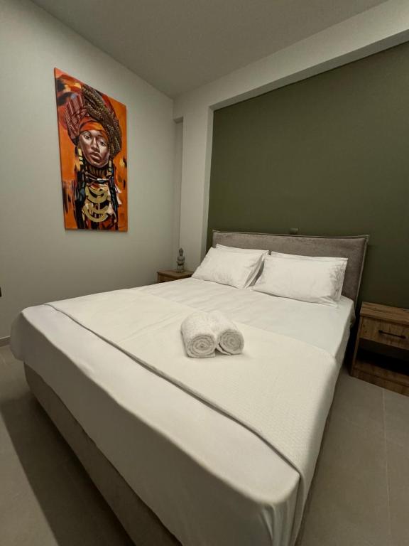Postel nebo postele na pokoji v ubytování Baja Suites
