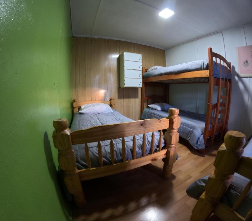 Postel nebo postele na pokoji v ubytování Hostel 53 Sur