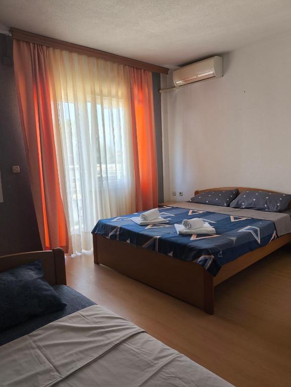 Postel nebo postele na pokoji v ubytování Hotel ARISTON