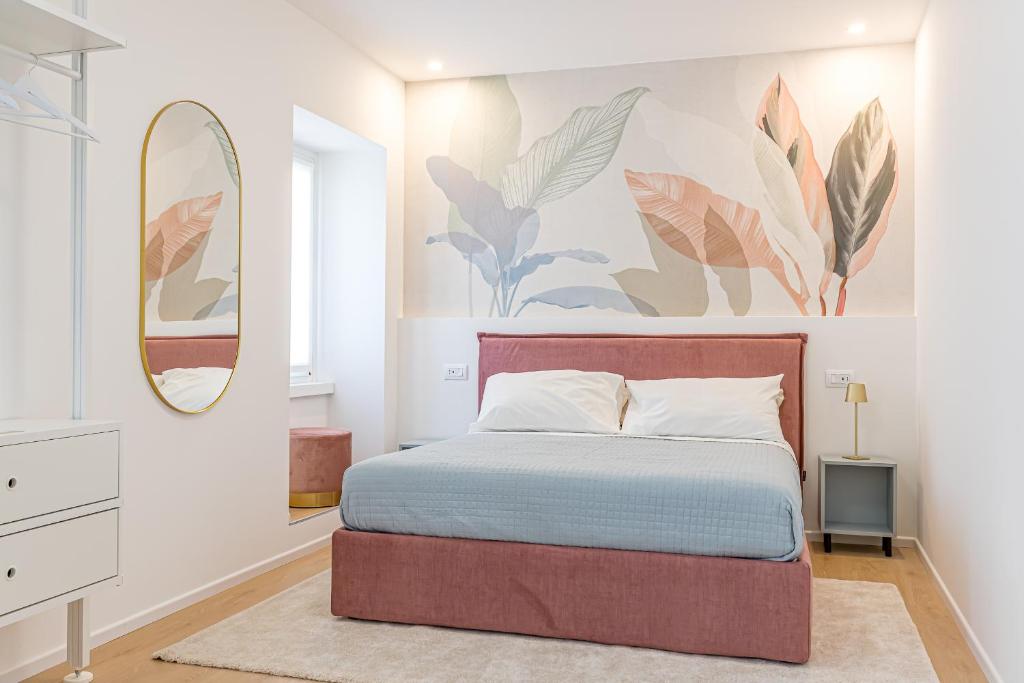 Postel nebo postele na pokoji v ubytování Goldie&Leon rooms Cernobbio