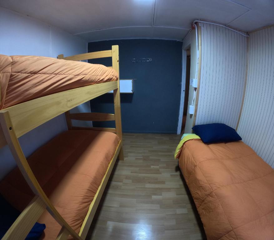 Postel nebo postele na pokoji v ubytování Hostel 53 Sur