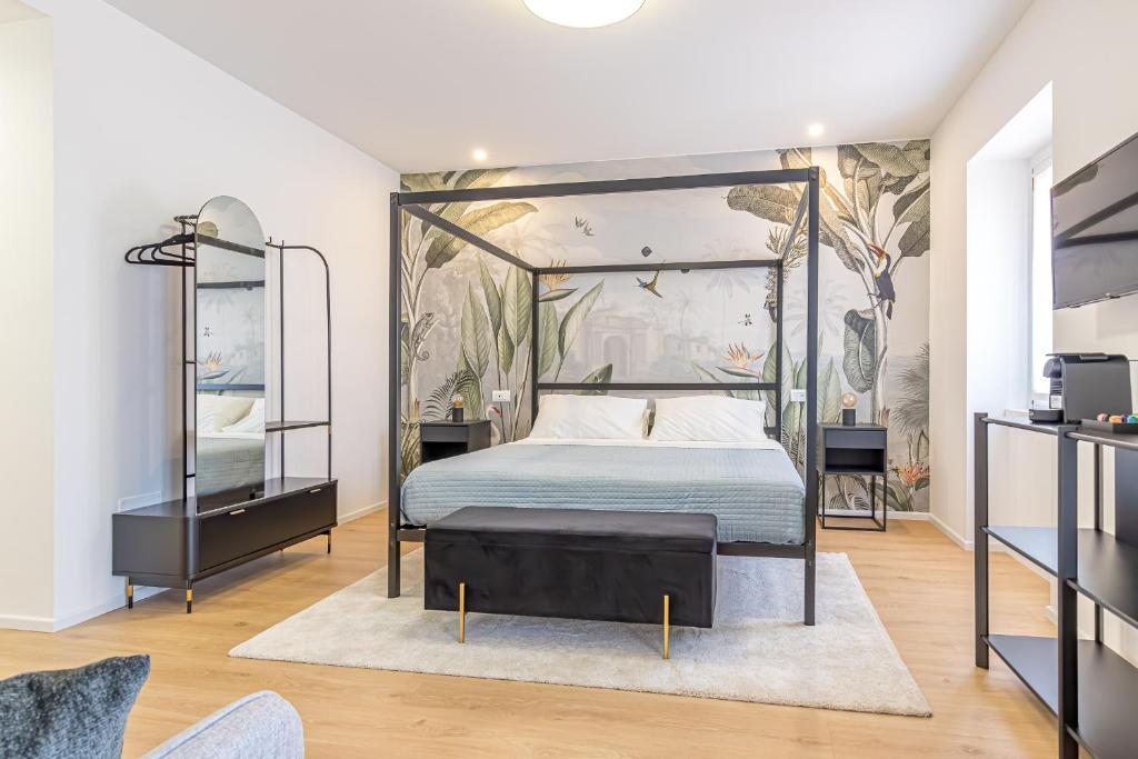 Postel nebo postele na pokoji v ubytování Goldie&Leon rooms Cernobbio
