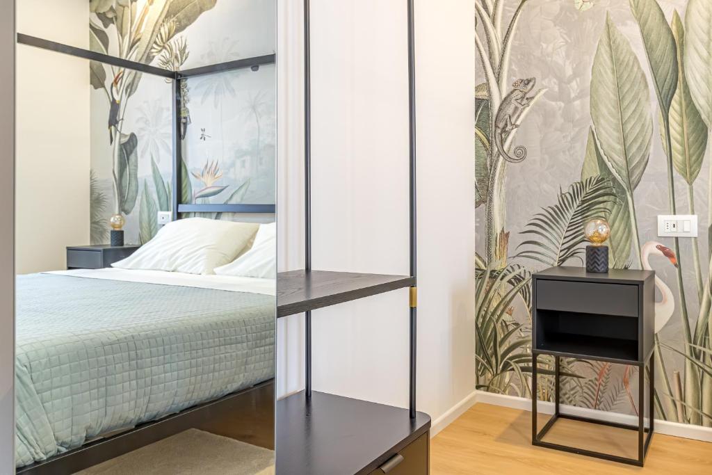 Postel nebo postele na pokoji v ubytování Goldie&Leon rooms Cernobbio