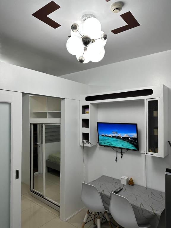 TV a/nebo společenská místnost v ubytování Shell Residences Staycation