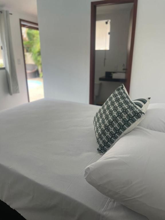 Postel nebo postele na pokoji v ubytování Do Adriano Suites