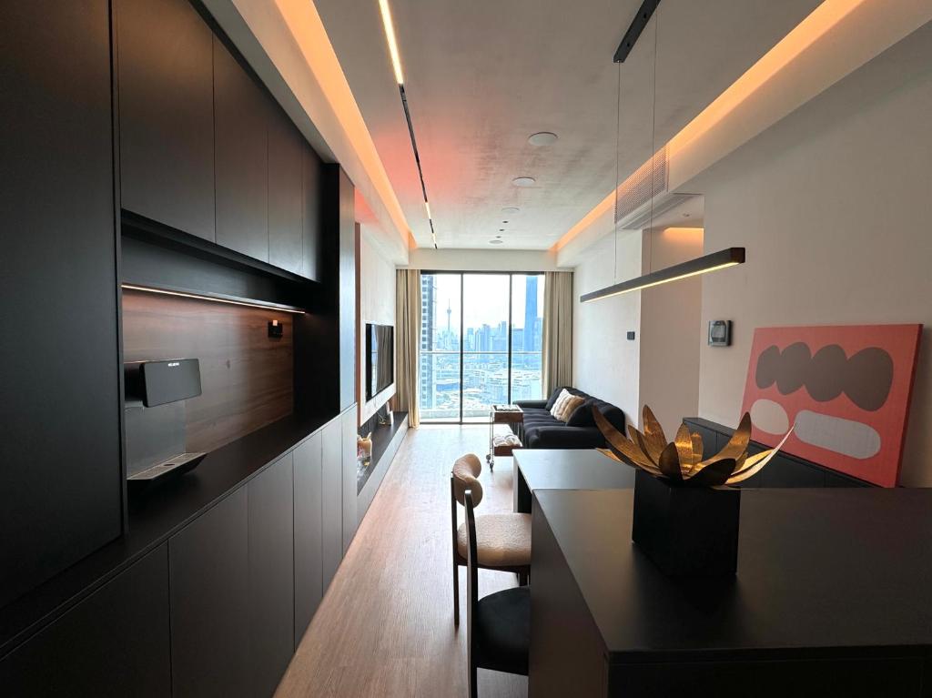 a living room with a couch and a table at Luxury AI Smart Home in KL in Kuala Lumpur