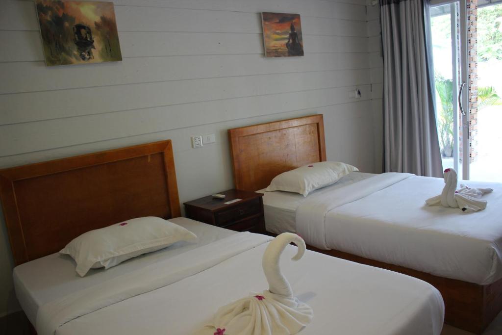 Postel nebo postele na pokoji v ubytování Scarlet Sails Hostel