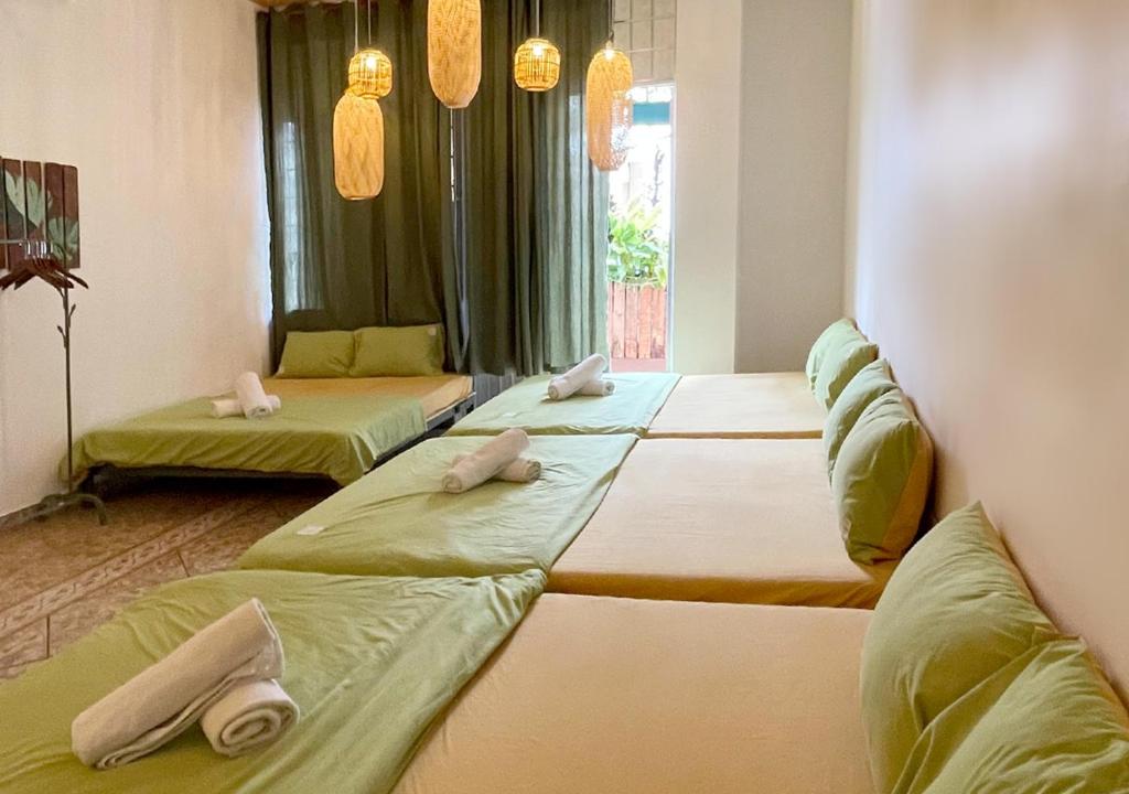 Postel nebo postele na pokoji v ubytování 5-homestay I