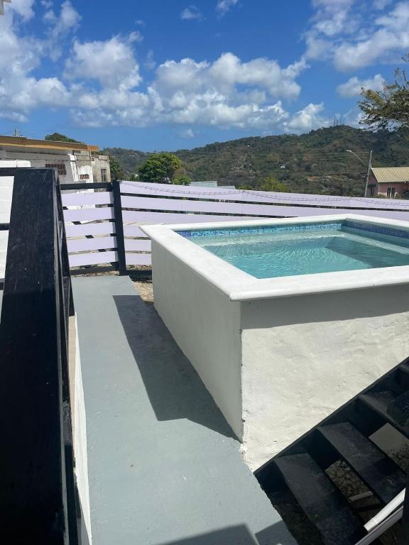 a swimming pool on top of a house at Breeze Manor in Scarborough