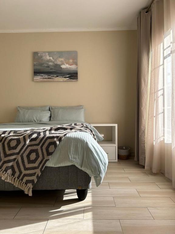 Cozy Central BNB Ezulwiniにあるベッド