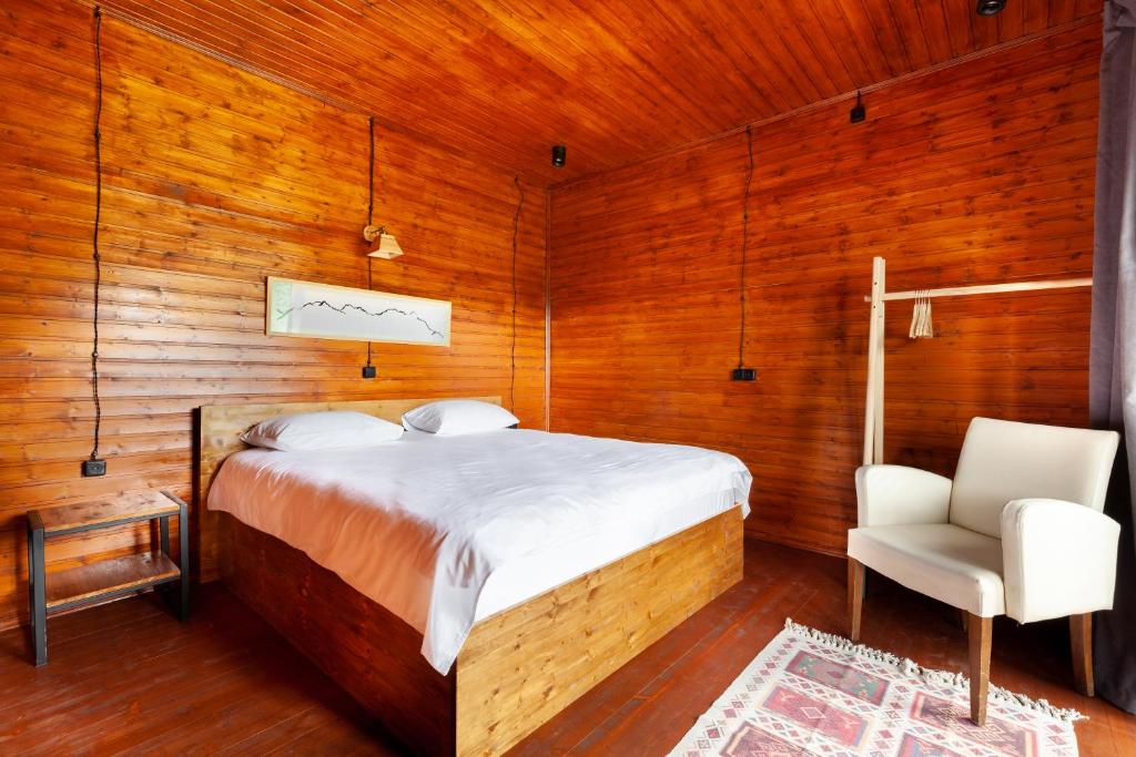 Postel nebo postele na pokoji v ubytování Hillside Tola