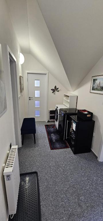 Telewizja i/lub zestaw kina domowego w obiekcie Apartmány Na sjezdovce