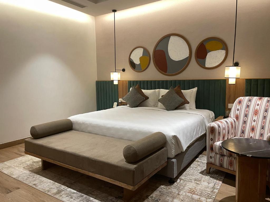Postel nebo postele na pokoji v ubytování Regency Tuticorin by GRT Hotels