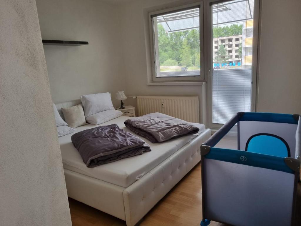 Postel nebo postele na pokoji v ubytování Beautiful modern decorated flat