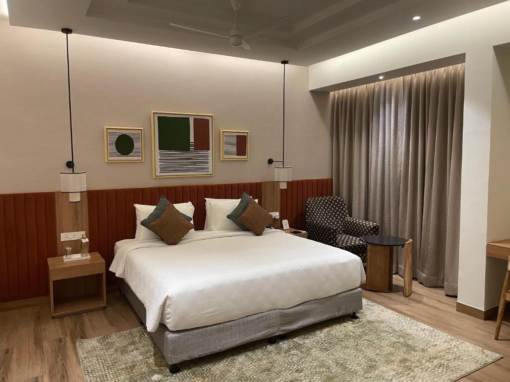 Postel nebo postele na pokoji v ubytování Regency Tuticorin by GRT Hotels
