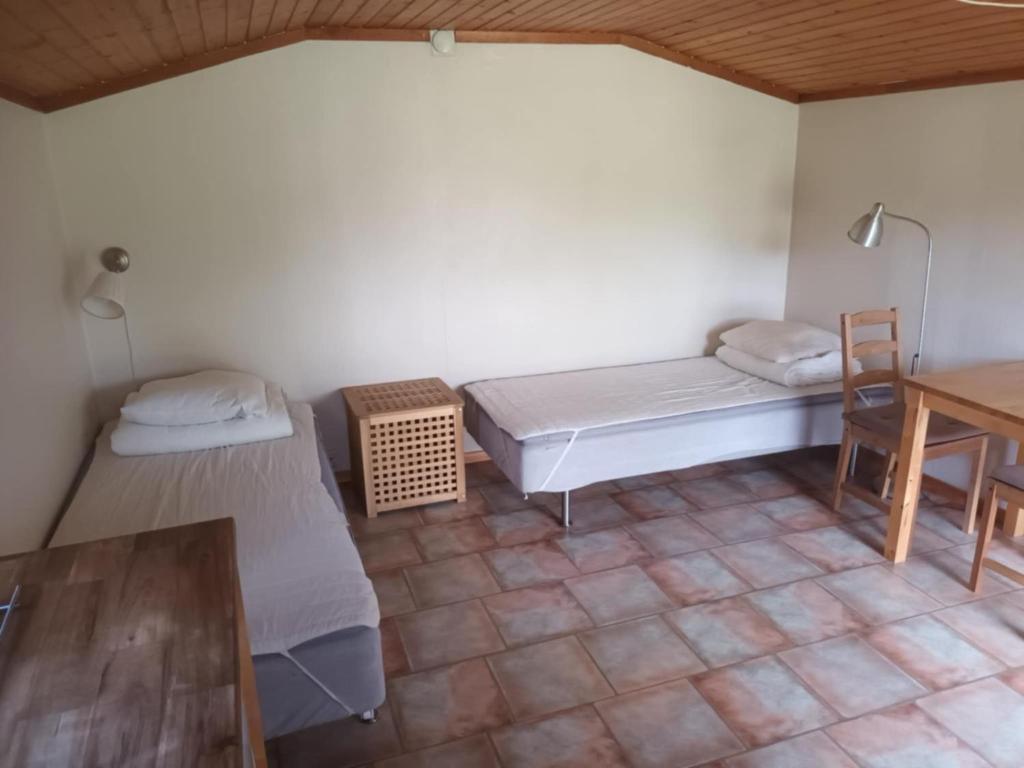 Postel nebo postele na pokoji v ubytování Torne Camping - Kano & Fiskecamp