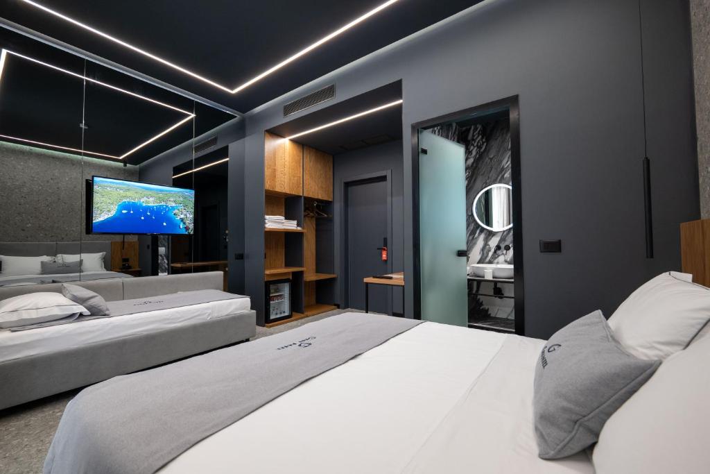 Postel nebo postele na pokoji v ubytování Gest Hotel