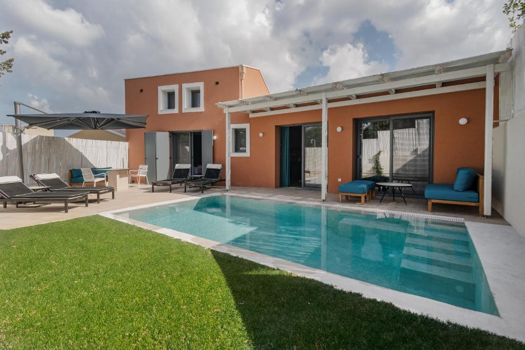 Bazén v ubytování Tessera Villas & Studios Collection nebo v jeho okolí