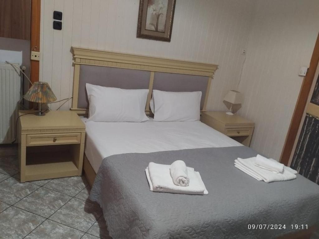 Posteľ alebo postele v izbe v ubytovaní Erini Room