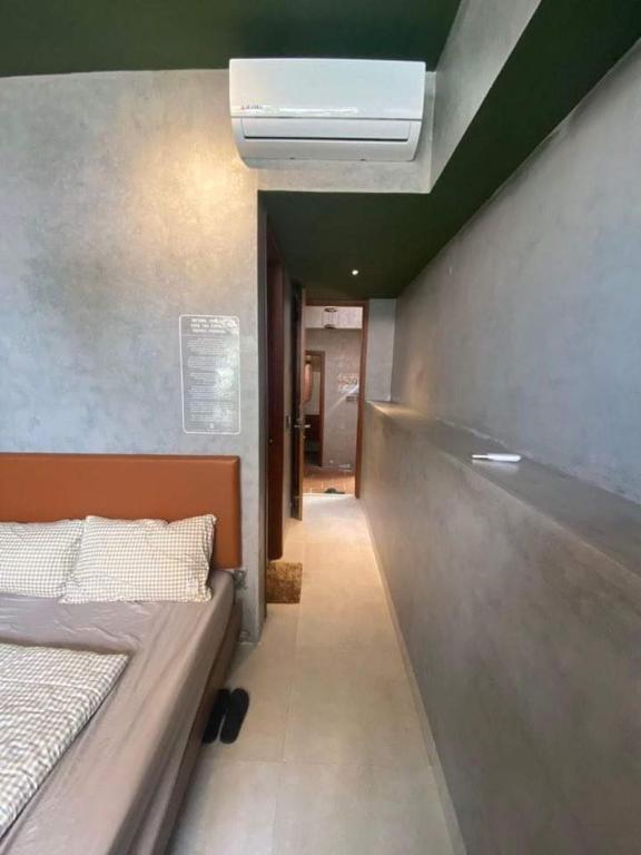 Postel nebo postele na pokoji v ubytování 5-homestay I