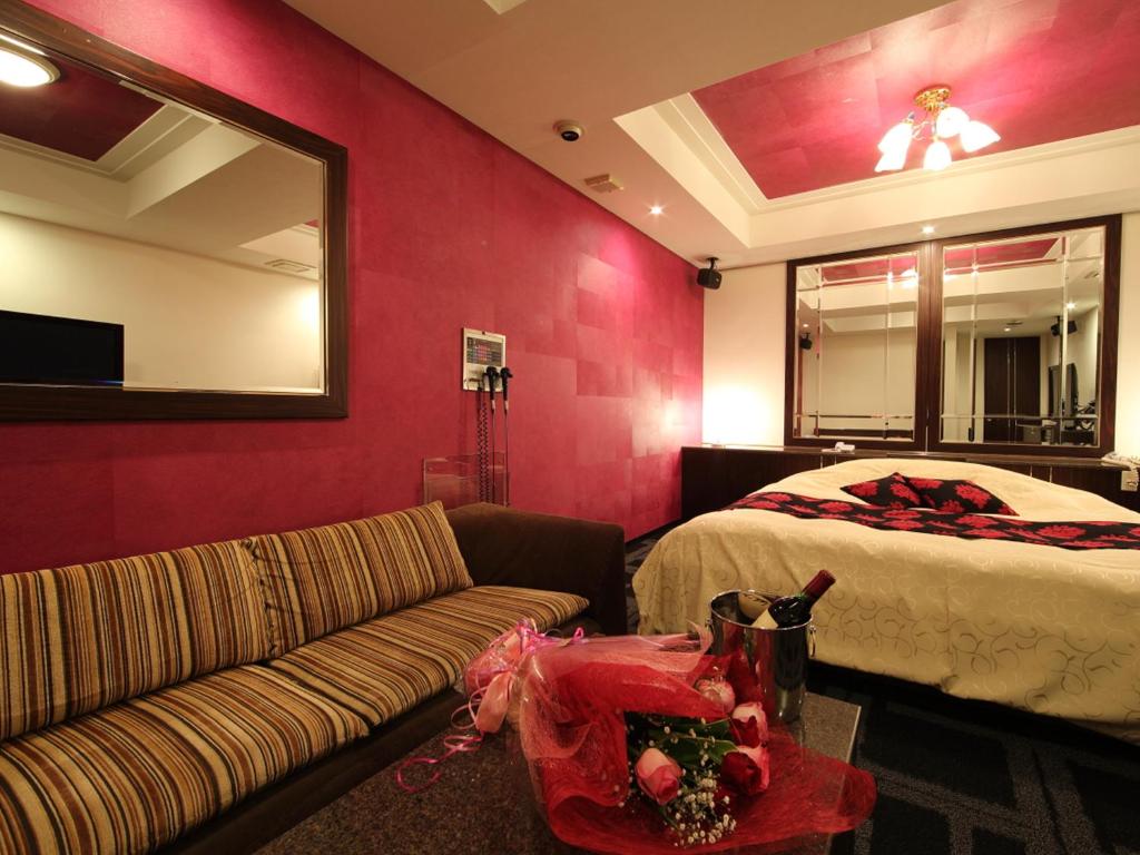 Postel nebo postele na pokoji v ubytování Hotel La Siesta (Adult Only)