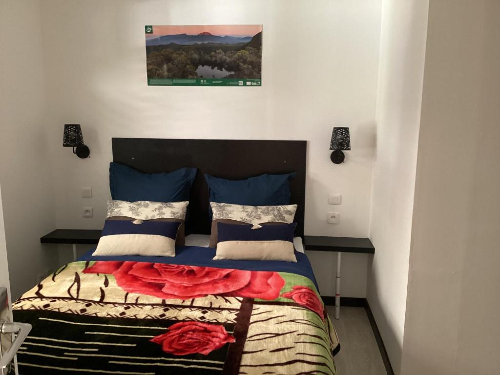 Postel nebo postele na pokoji v ubytování LES AGAPANTHES du 27 -ème