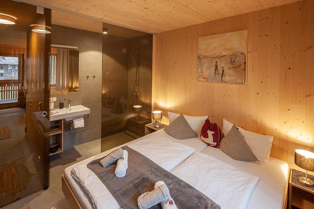 Posteľ alebo postele v izbe v ubytovaní Eichen Lodge Mellau