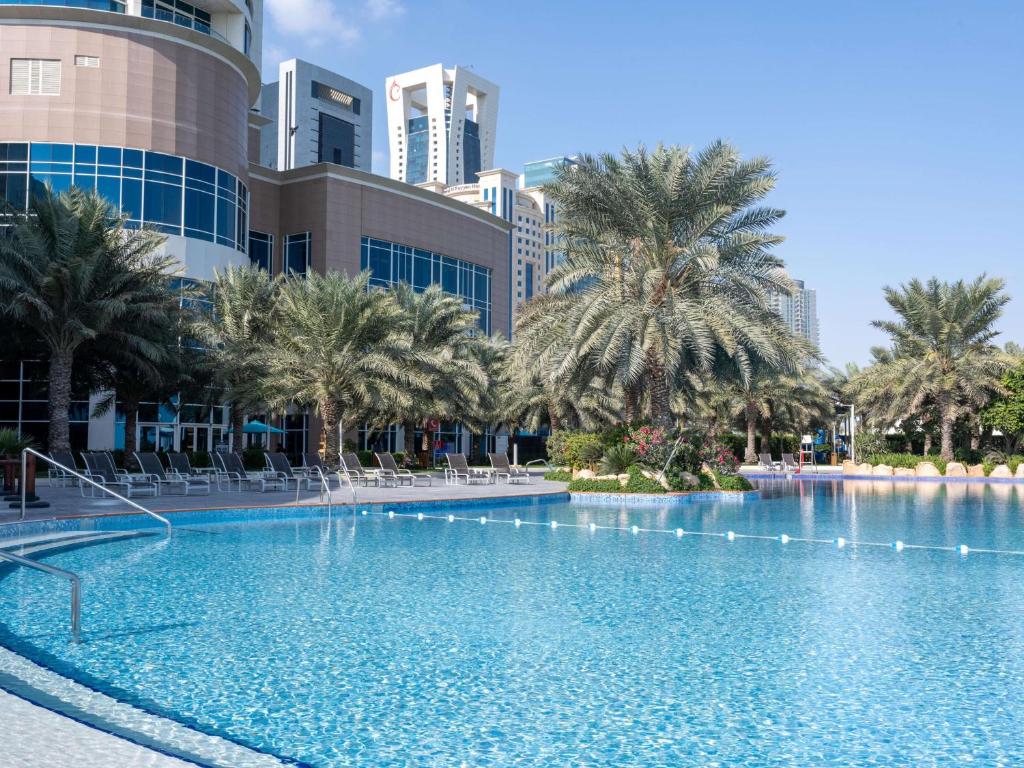 Bazén v ubytování Hilton Doha nebo v jeho okolí