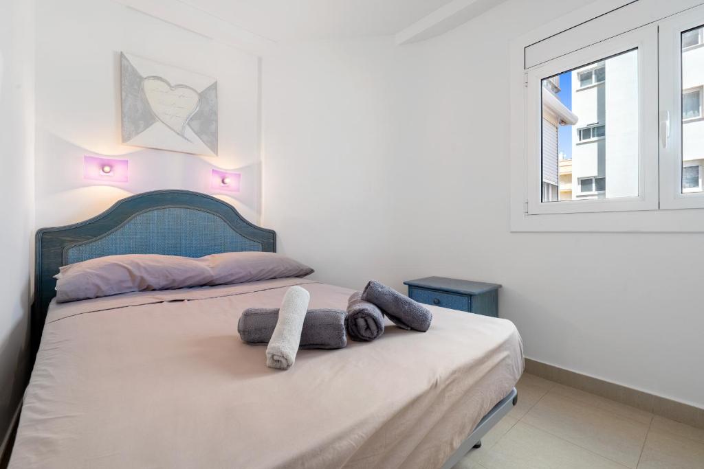 Postel nebo postele na pokoji v ubytování Hauzify I Apartament Cannes