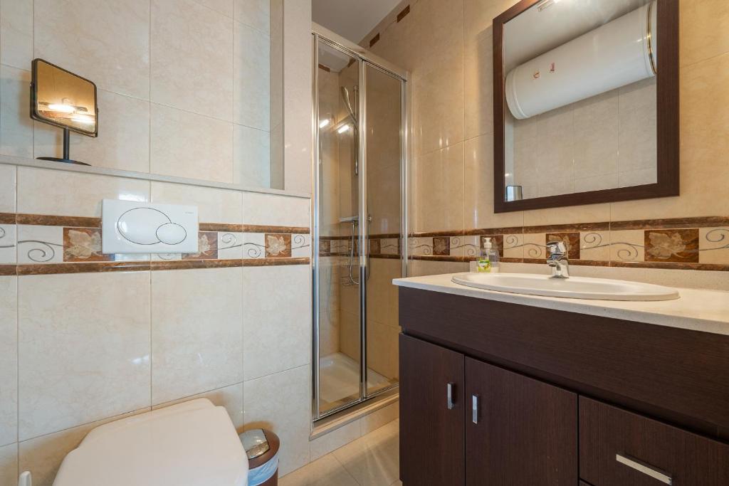 Koupelna v ubytování Hauzify I Apartament Cannes