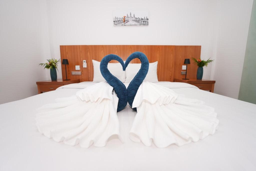 Postel nebo postele na pokoji v ubytování Amor Resort Koh Rong