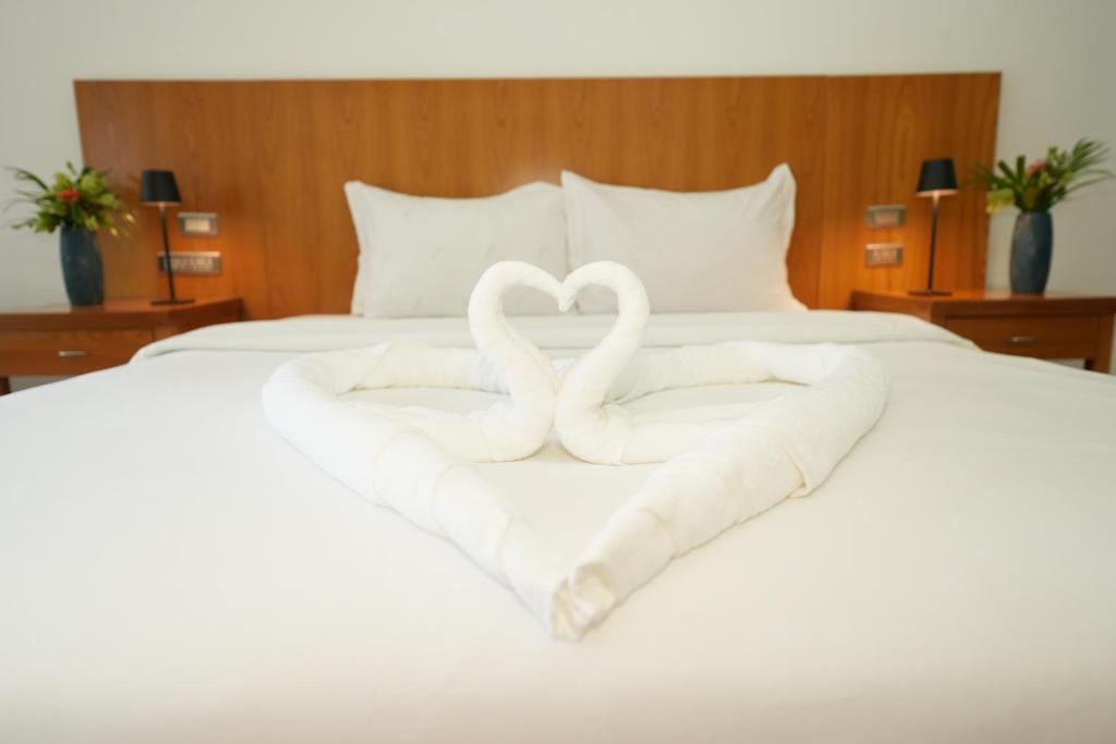 Postel nebo postele na pokoji v ubytování Amor Resort Koh Rong