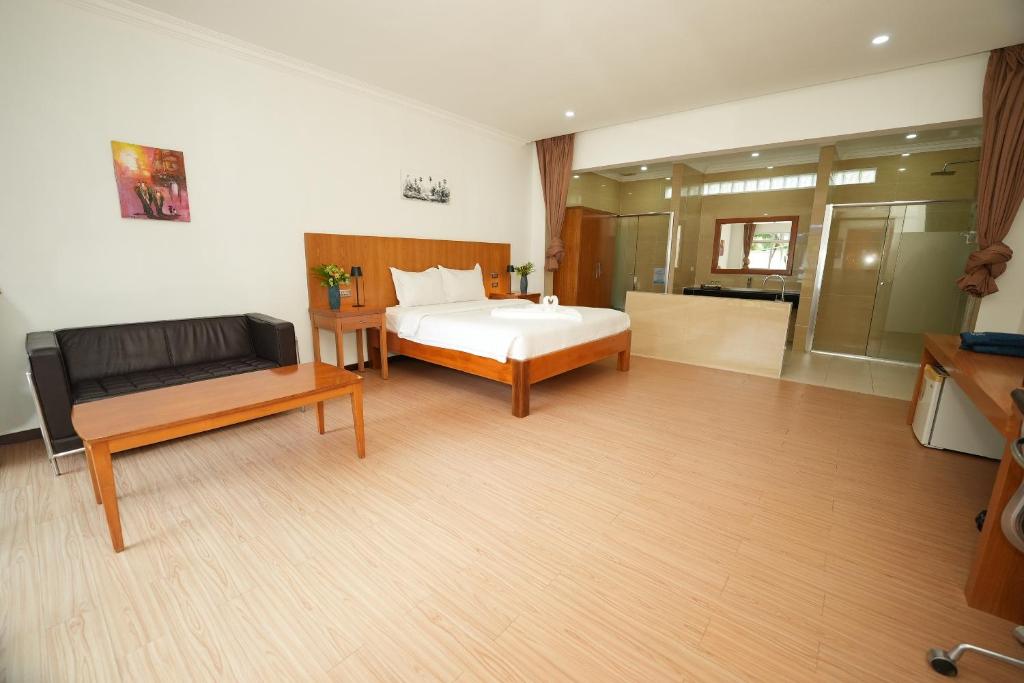 Postel nebo postele na pokoji v ubytování Amor Resort Koh Rong