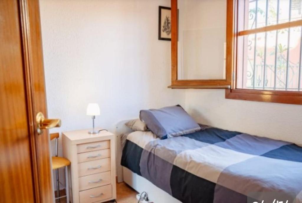 Giường trong phòng chung tại Villa Rosal