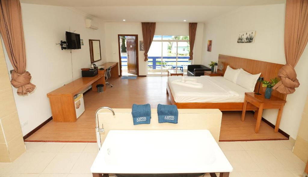 Postel nebo postele na pokoji v ubytování Amor Resort Koh Rong