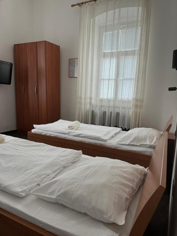 Postel nebo postele na pokoji v ubytování Guesthouse Pri Tonetu