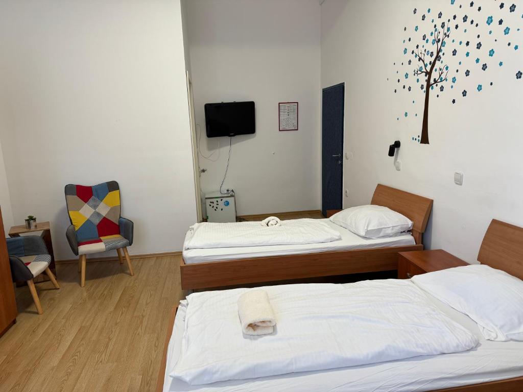 Postel nebo postele na pokoji v ubytování Guesthouse Pri Tonetu