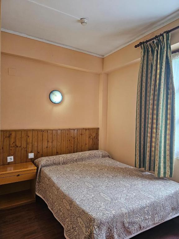Postel nebo postele na pokoji v ubytování Hotel Hipic