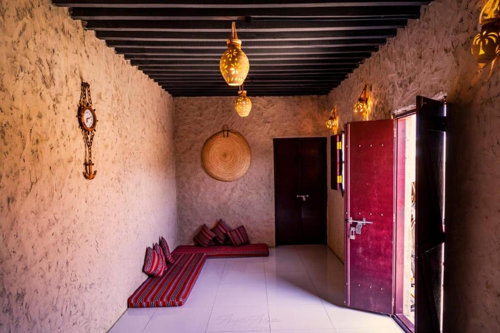 Postel nebo postele na pokoji v ubytování Canyon Rest House Jabal Shams